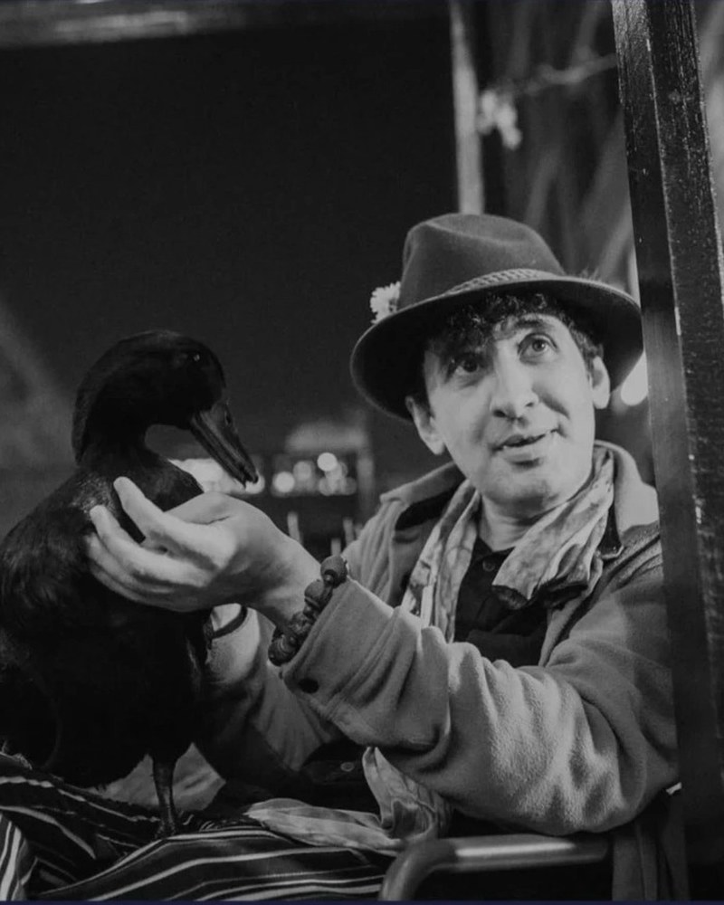 David De Hannay in a hat with a duck, black and white photograph